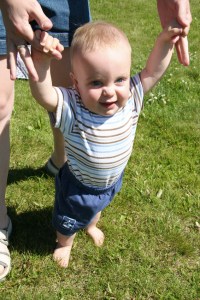 little boy learning to walk